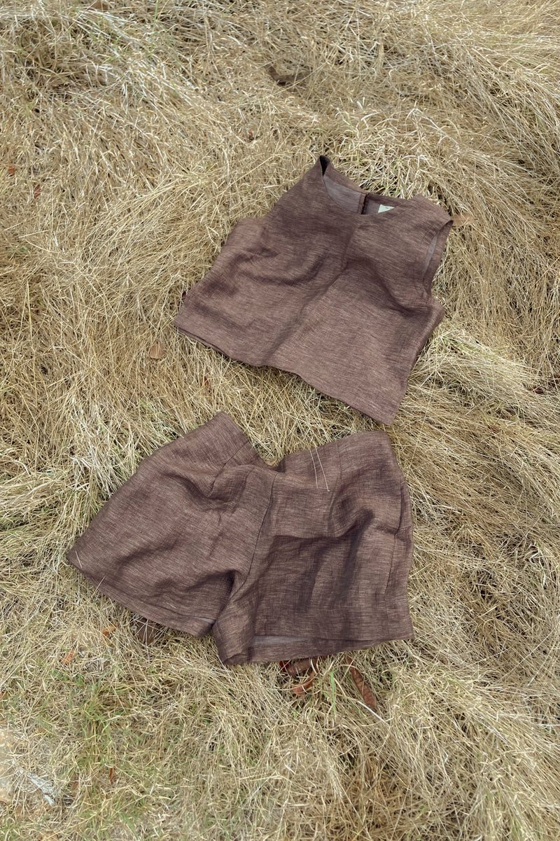 linen outfit on top of soft grass countryside